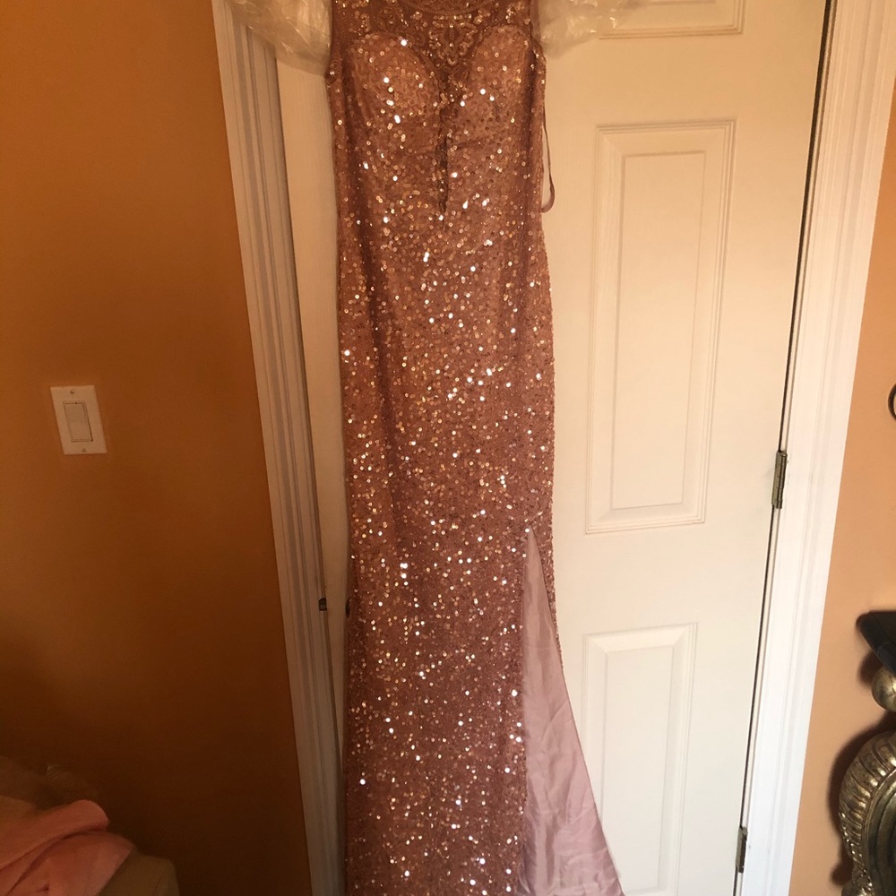 Beautiful peachy pink gown only worn 2x’s.